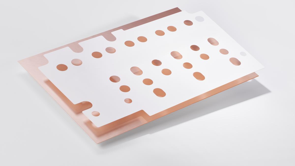 Busbar insulation cut to size on copper plate